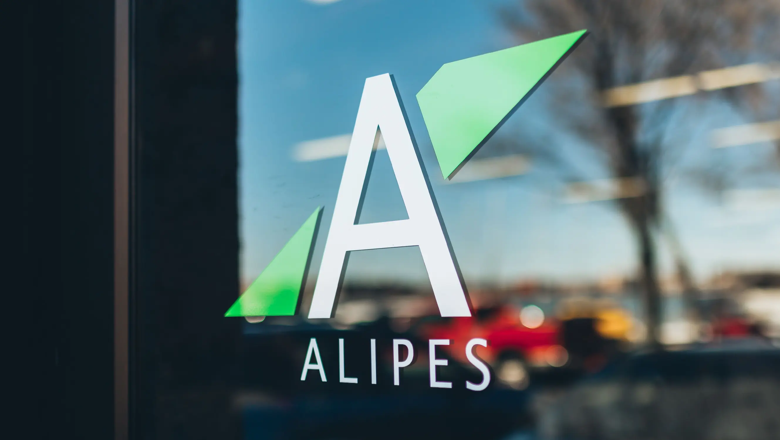 Alipes logo on their Boston office door