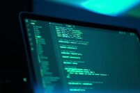 Close-up of computer screen with programming code in a text editor, representing software development and coding.